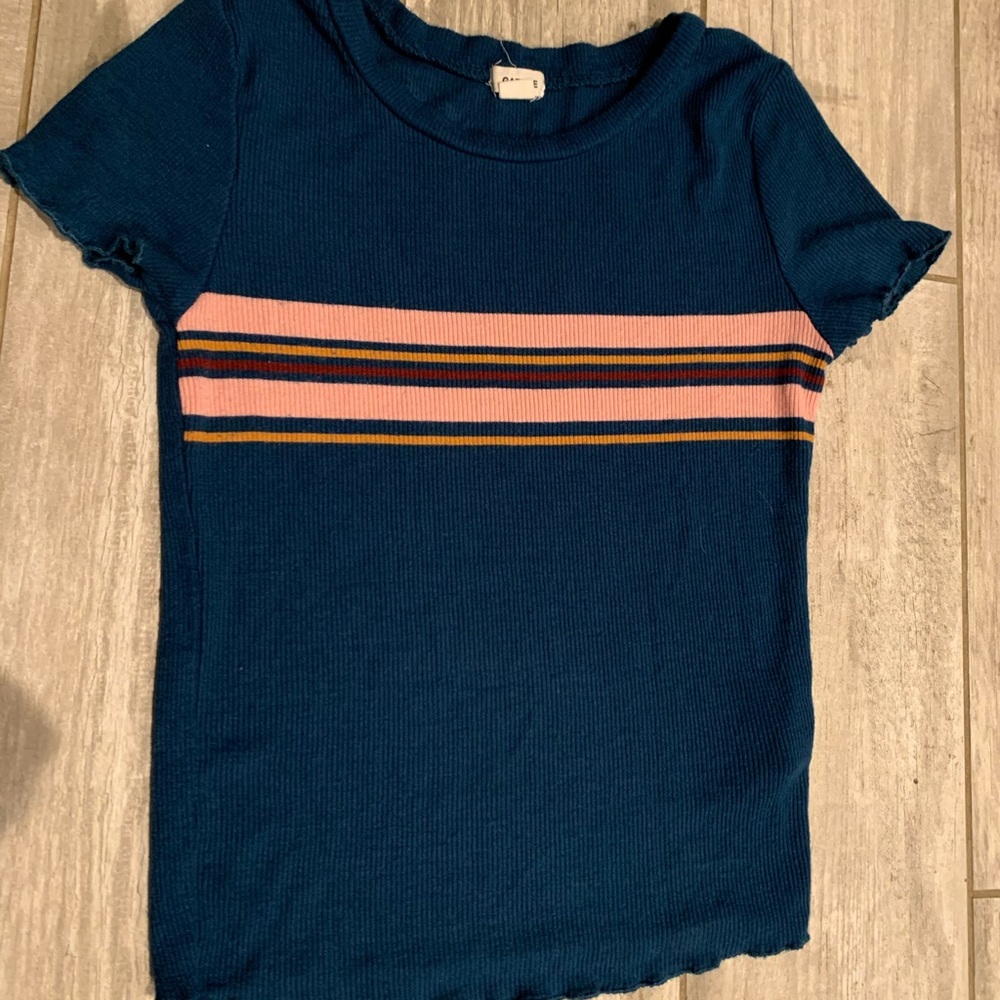 Tight fitting, dark blue/navy shirt